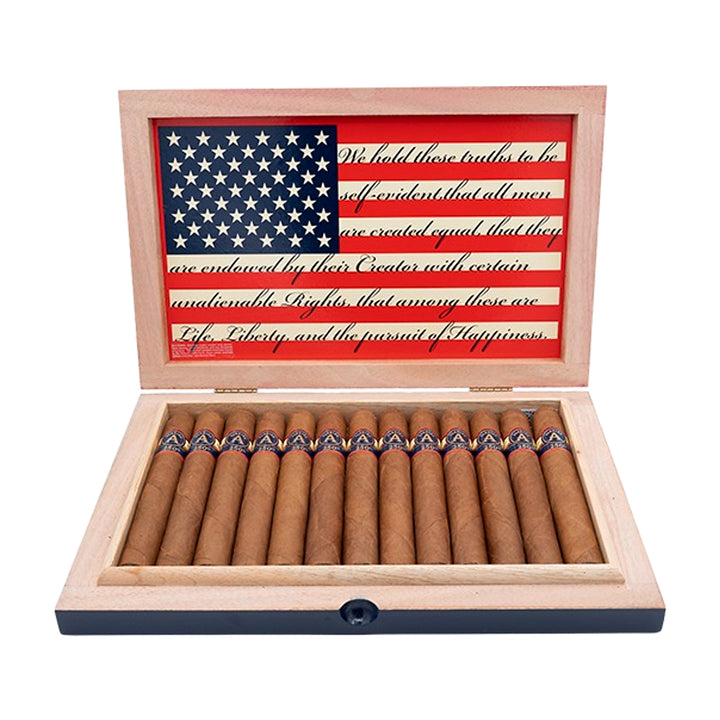 Open box of Aladino 250th Toro premium cigars showing the flag lid artwork and cigars inside.