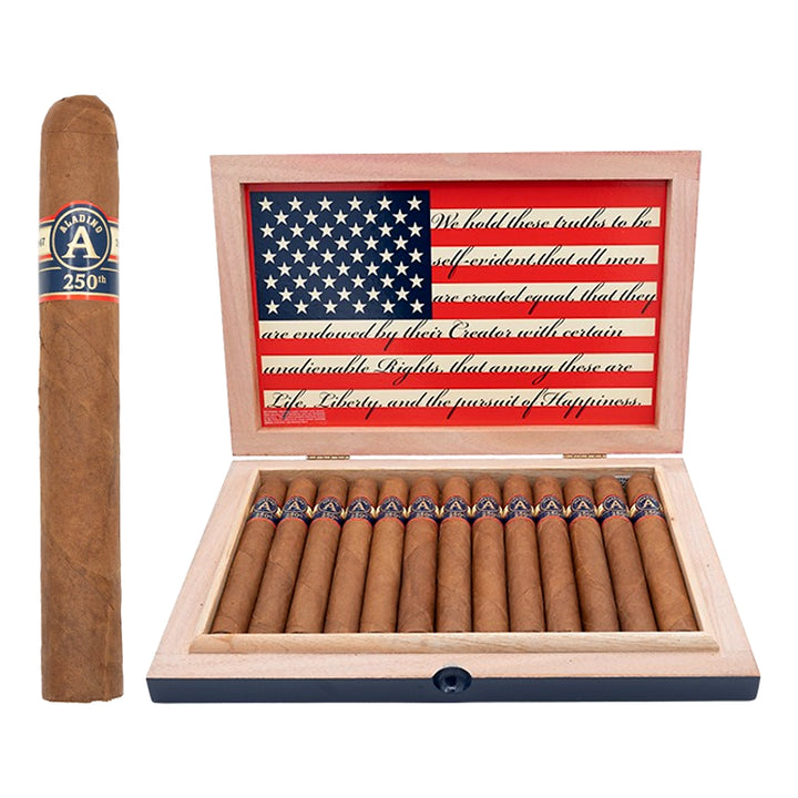 Aladino 250th Toro 6 x 52 Honduran cigars in an open box with a single cigar displayed beside the box.