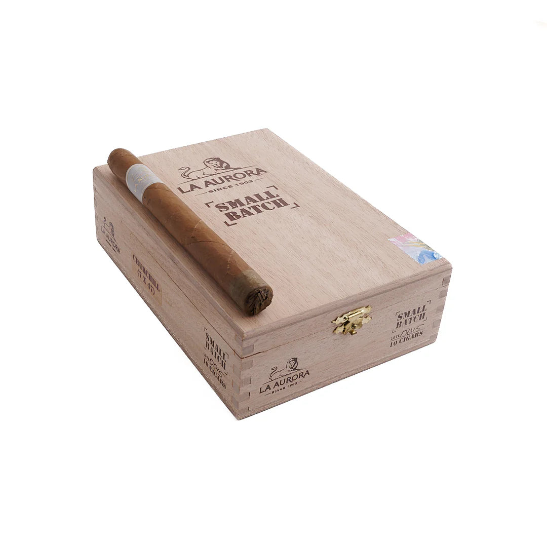 La Aurora Small Batch cigars in a wooden box on a white background