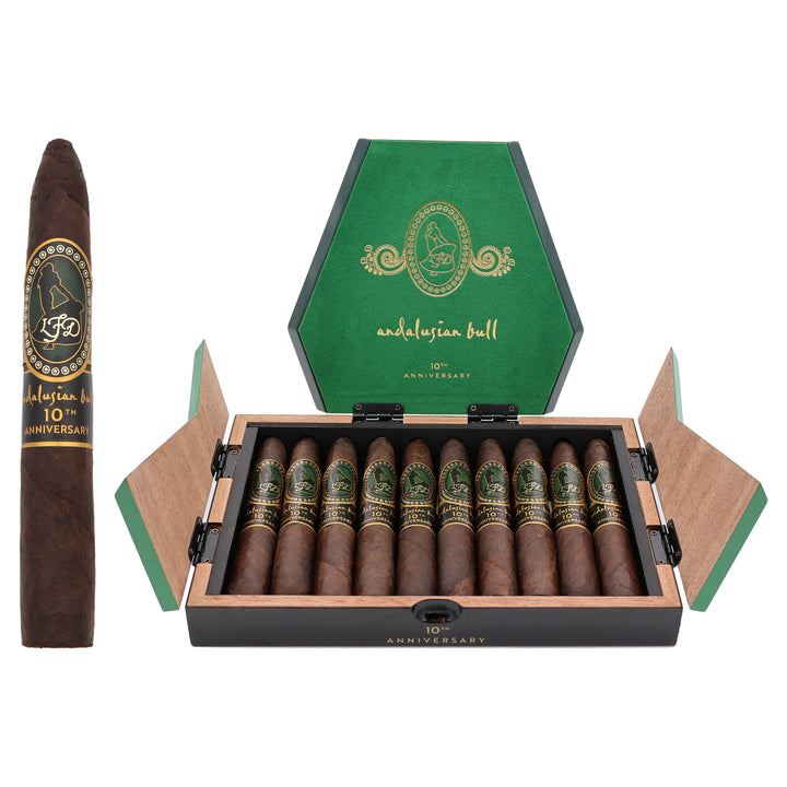 La Flor Dominicana Andalusian Bull 10th Anniversary Maduro cigar, 6.5 × 52/64, with Connecticut broadleaf wrapper, beside its open box of 10