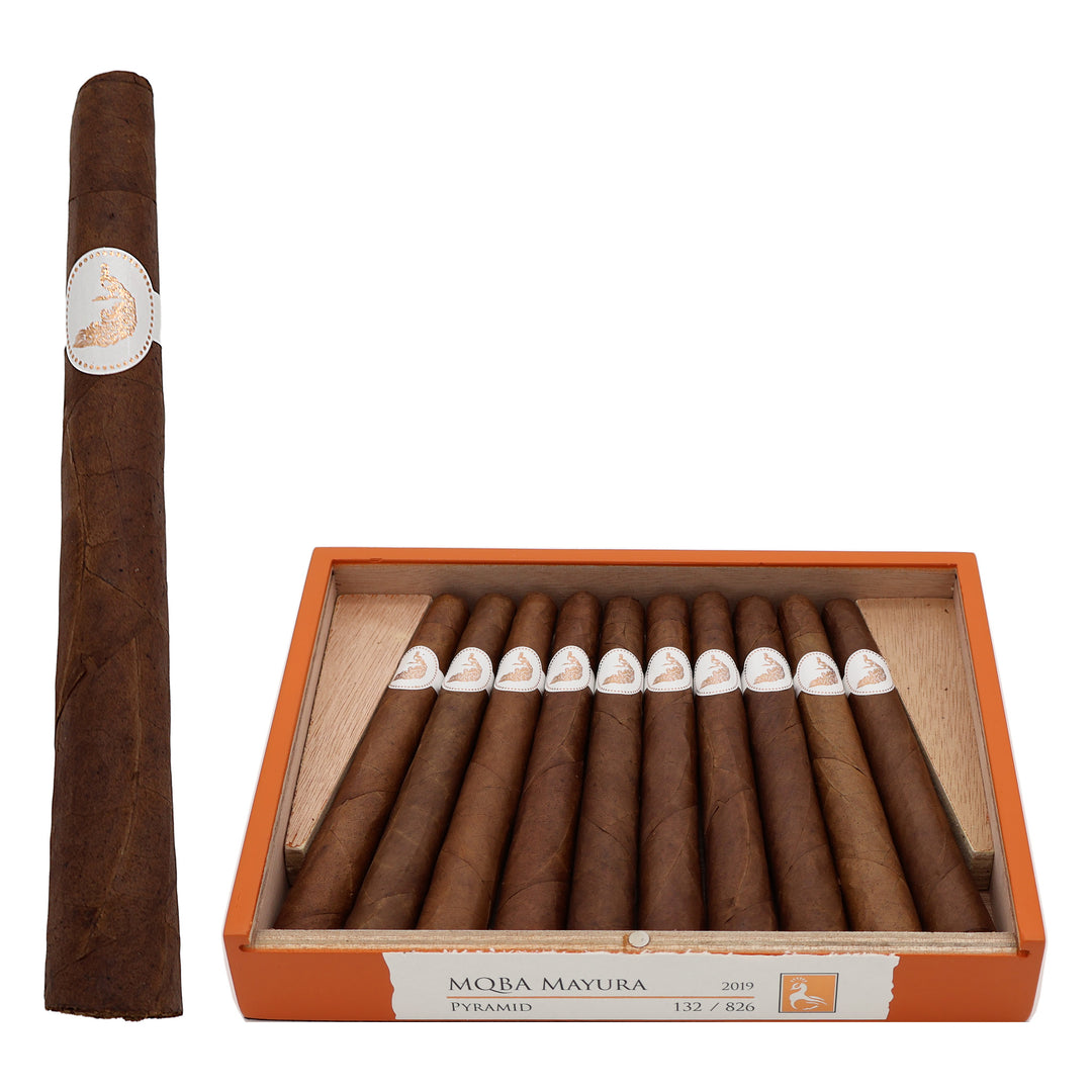 MBombay MQBA Mayura Pyramid premium cigars in an open box with a single cigar displayed beside the box.