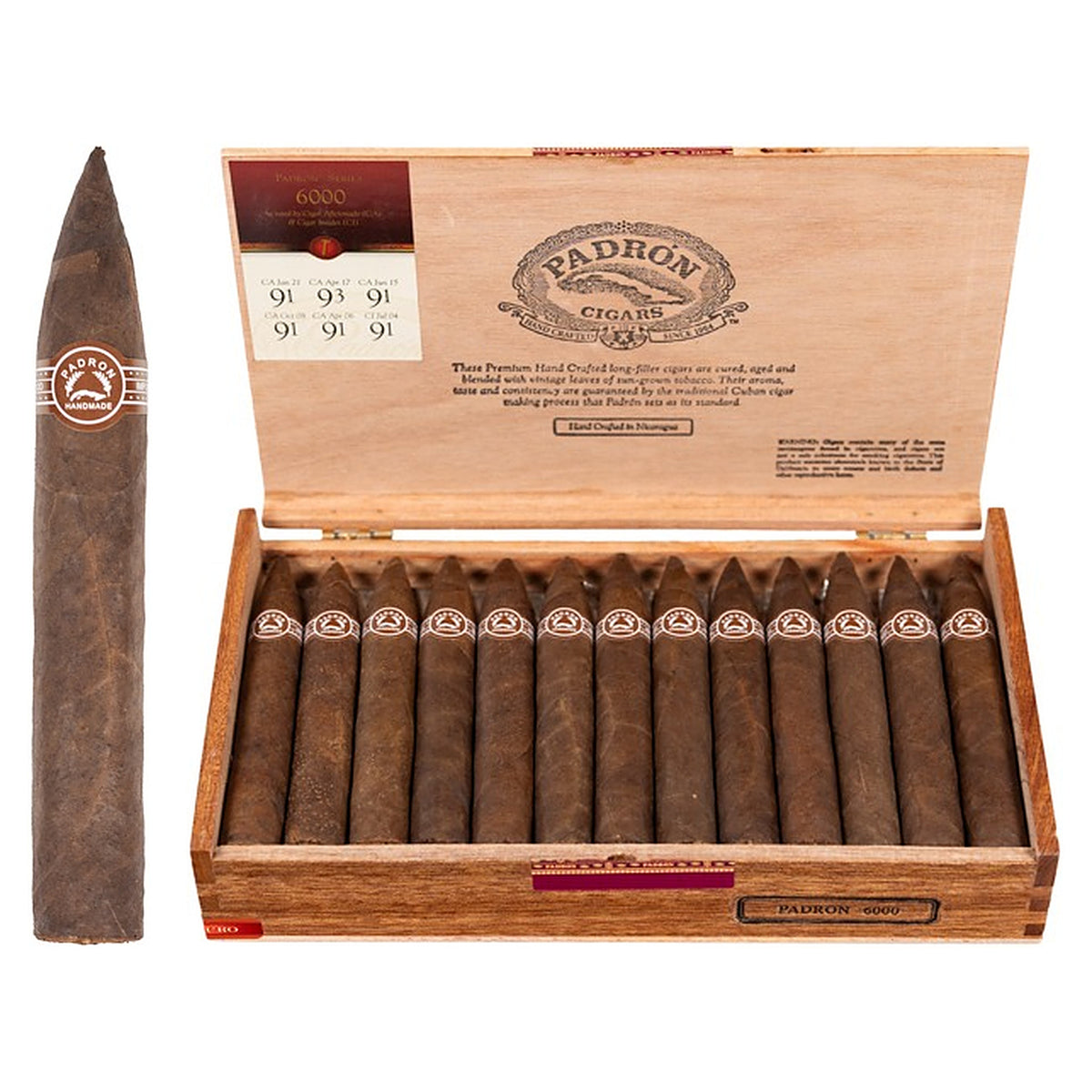 Padron 6000 Maduro cigar, 5.5 × 52, with Nicaraguan maduro wrapper, beside its open box of 26