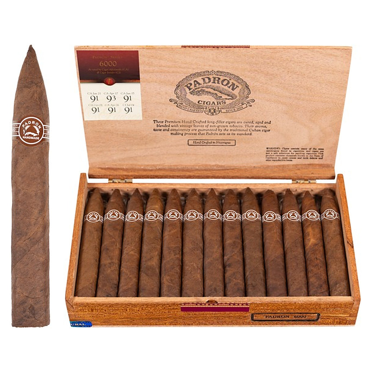 Padron 6000 Natural cigar, 5.5 × 52, with Nicaraguan natural wrapper, beside its open box of 26