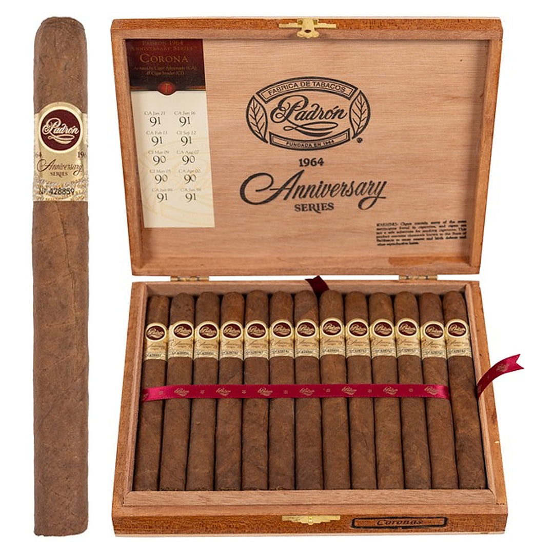 Padron 1964 Anniversary Series Corona Natural cigar, 6 × 42, with Nicaraguan natural wrapper, beside its open box of 25