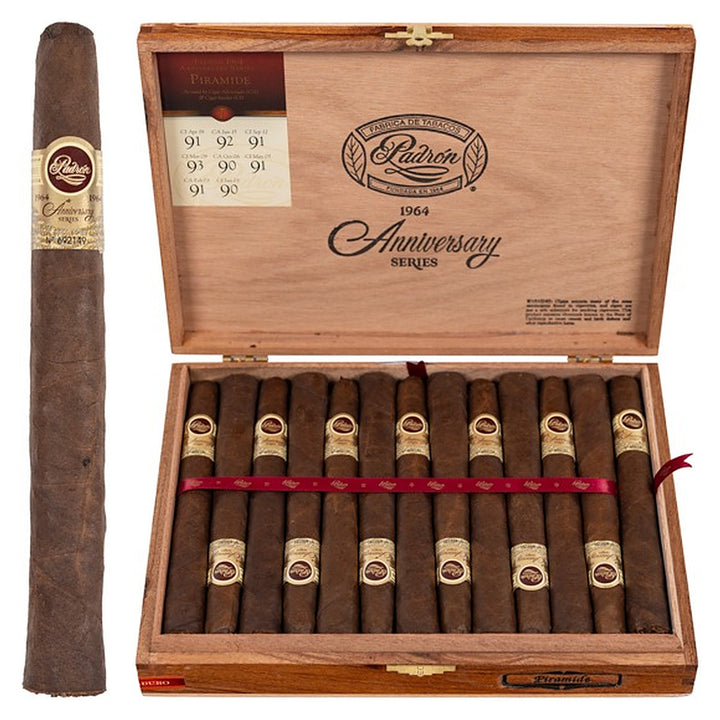 Padron 1964 Anniversary Series Piramides Maduro cigar, 6.88 × 52, with Nicaraguan maduro wrapper, beside its open box of 25