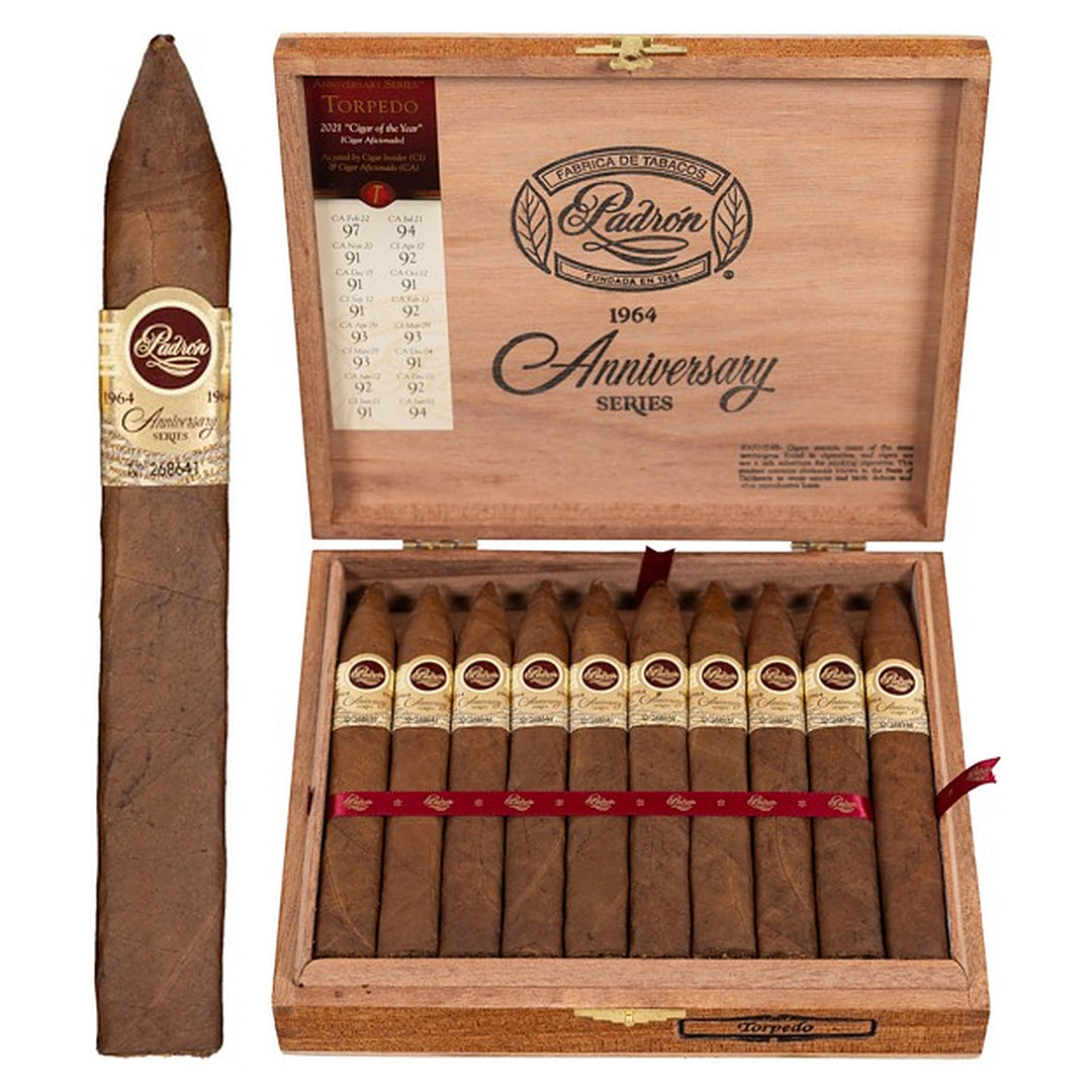 Padron 1964 Anniversary Series Torpedo Natural cigar, 6 × 52, with Nicaraguan natural wrapper, beside its open box of 20