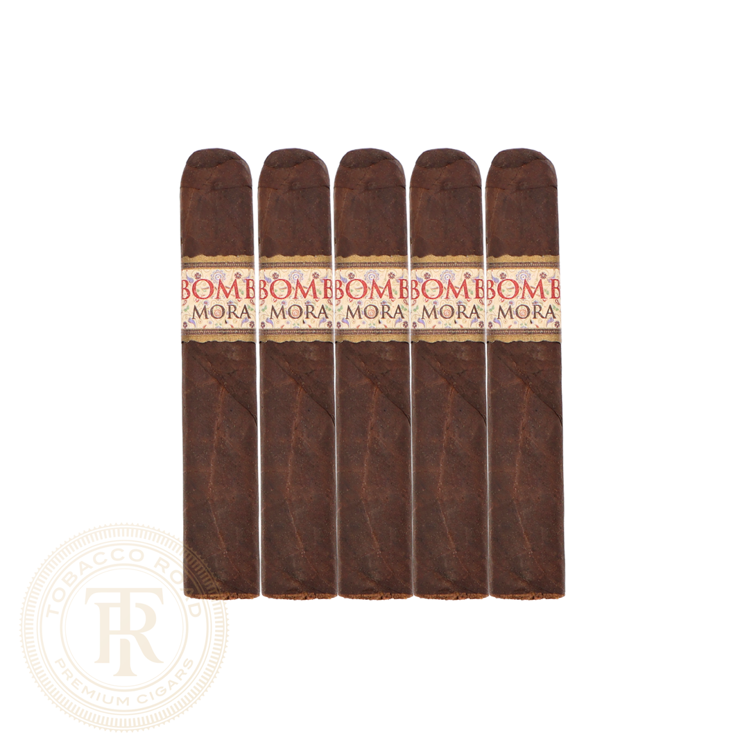 Five MBombay Palm Springs Mora Robusto premium cigars displayed together on a white background
